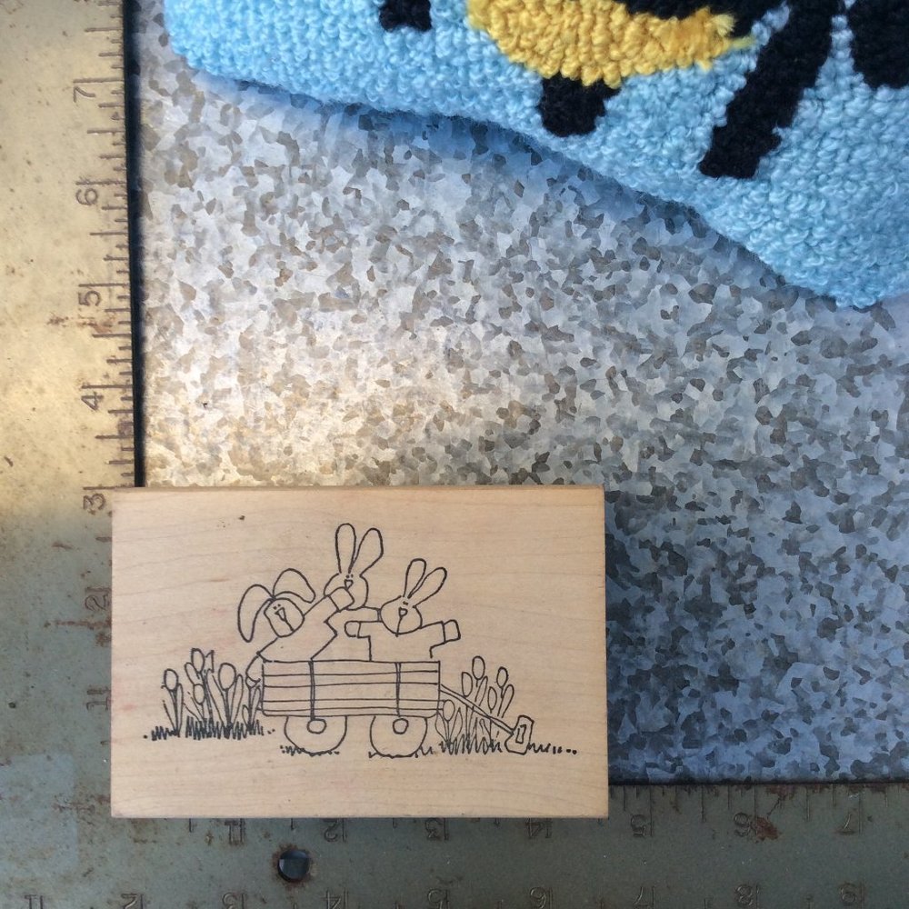 Three Bunnies in Wagon